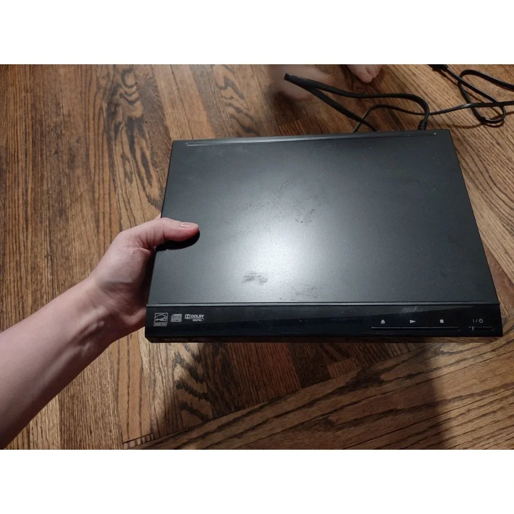 Sony DVP-SR210P Ultra Slim CD/DVD Player - Powers On / Ejects Includes Manual